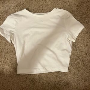 Four never worn colorful cropped t-shirts